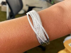 Baguette and Brilliant Cut Diamond Multi Row Hinged Bangle in 18k White Gold