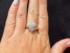 Baguette and Brilliant Cut Diamond Twist Ring in 14K Yellow Gold