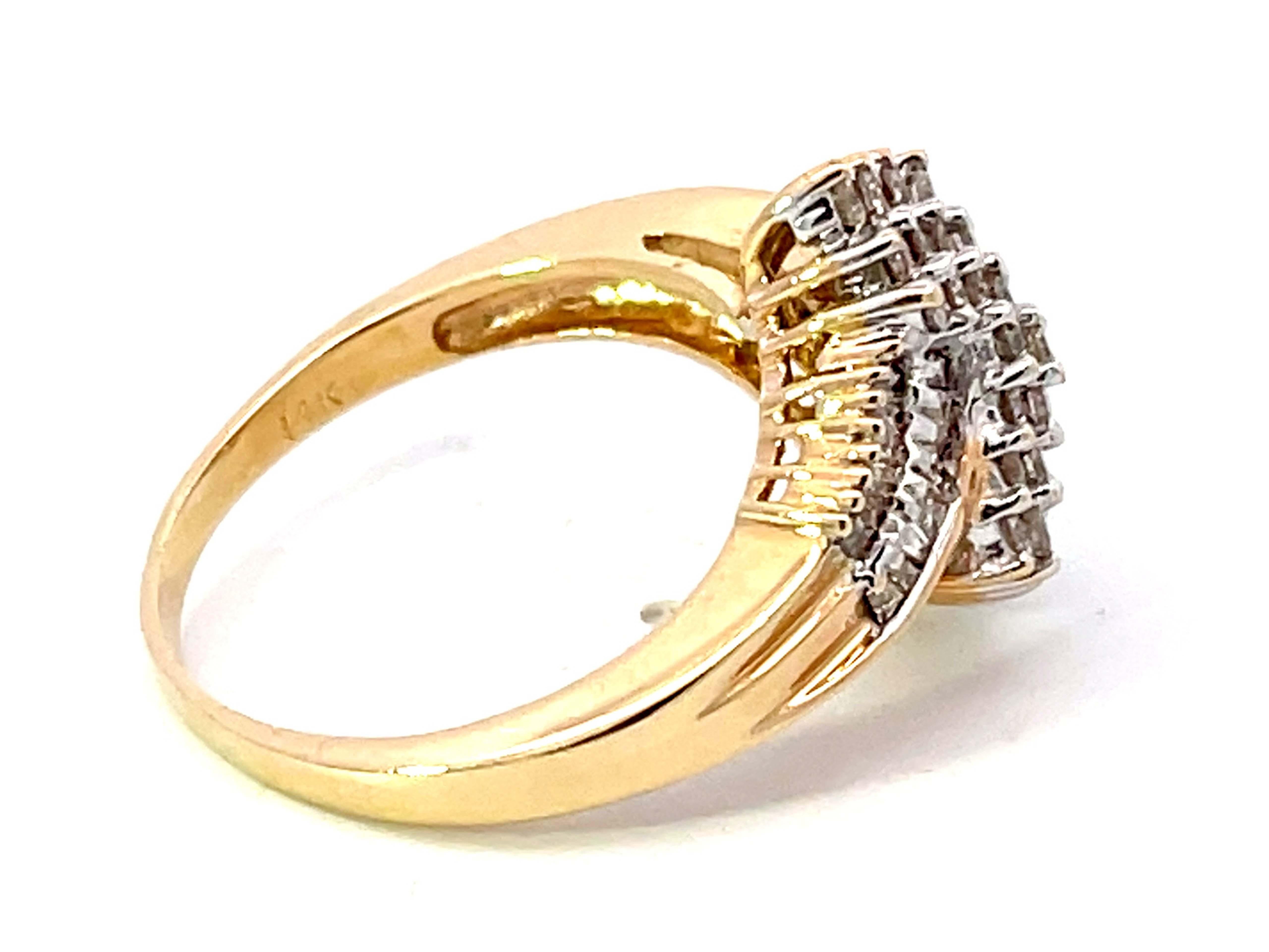 Women's or Men's Baguette and Brilliant Cut Diamond Twist Ring in 14K Yellow Gold For Sale