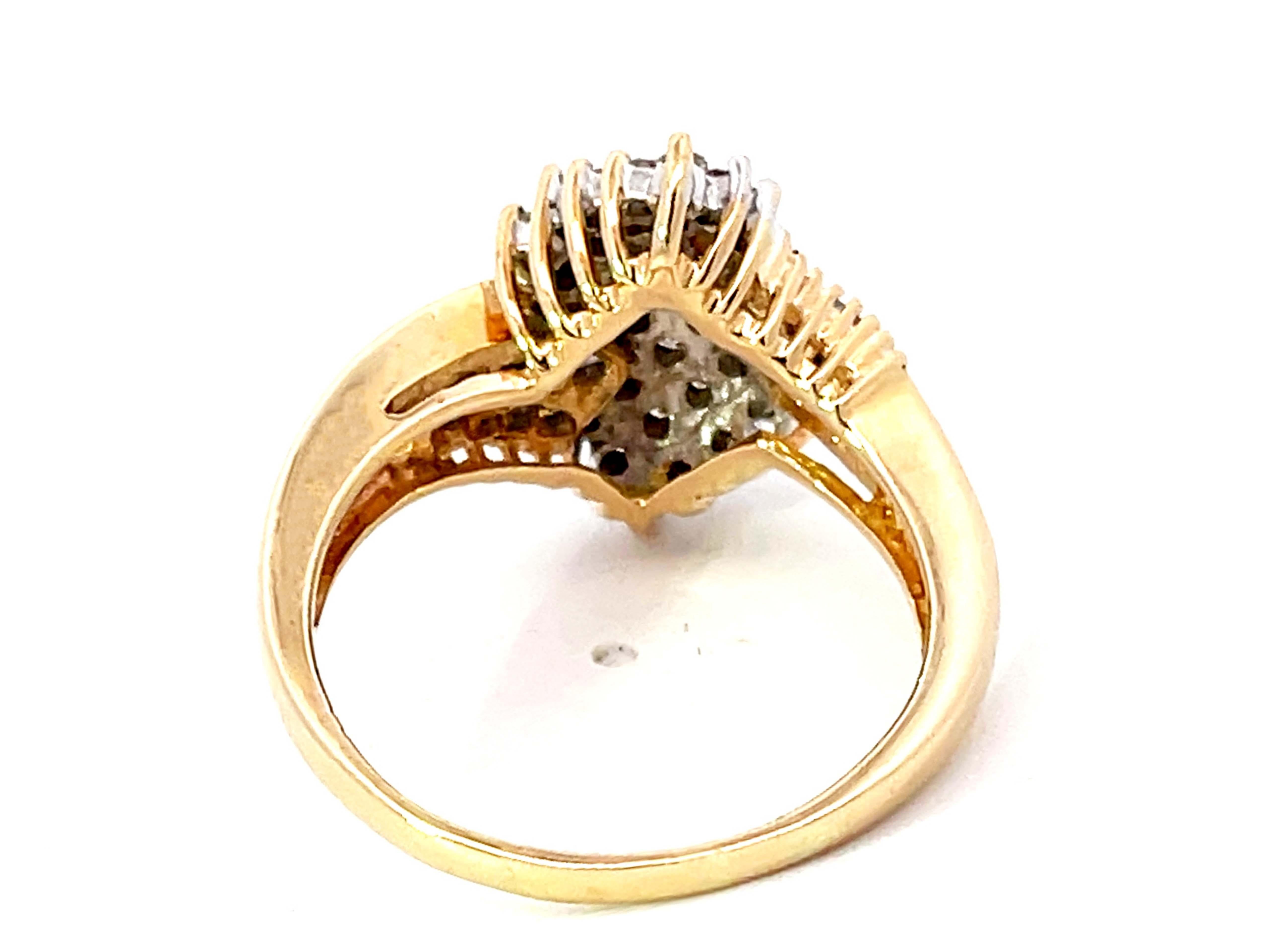 Baguette and Brilliant Cut Diamond Twist Ring in 14K Yellow Gold For Sale 2