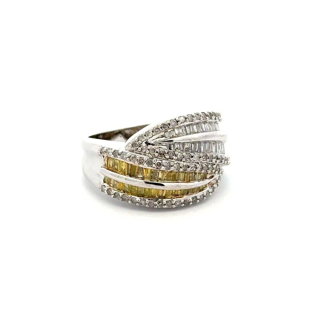 Simply Beautiful! Vintage White and Yellow Baguette and Round Brilliant cut Diamond Platinum Half Eternity Gold Crossover Band Ring. Securely Hand set with White Diamonds, weighing approx. 1.50tcw and Yellow Baguette Diamonds, approx. 0.80tcw.