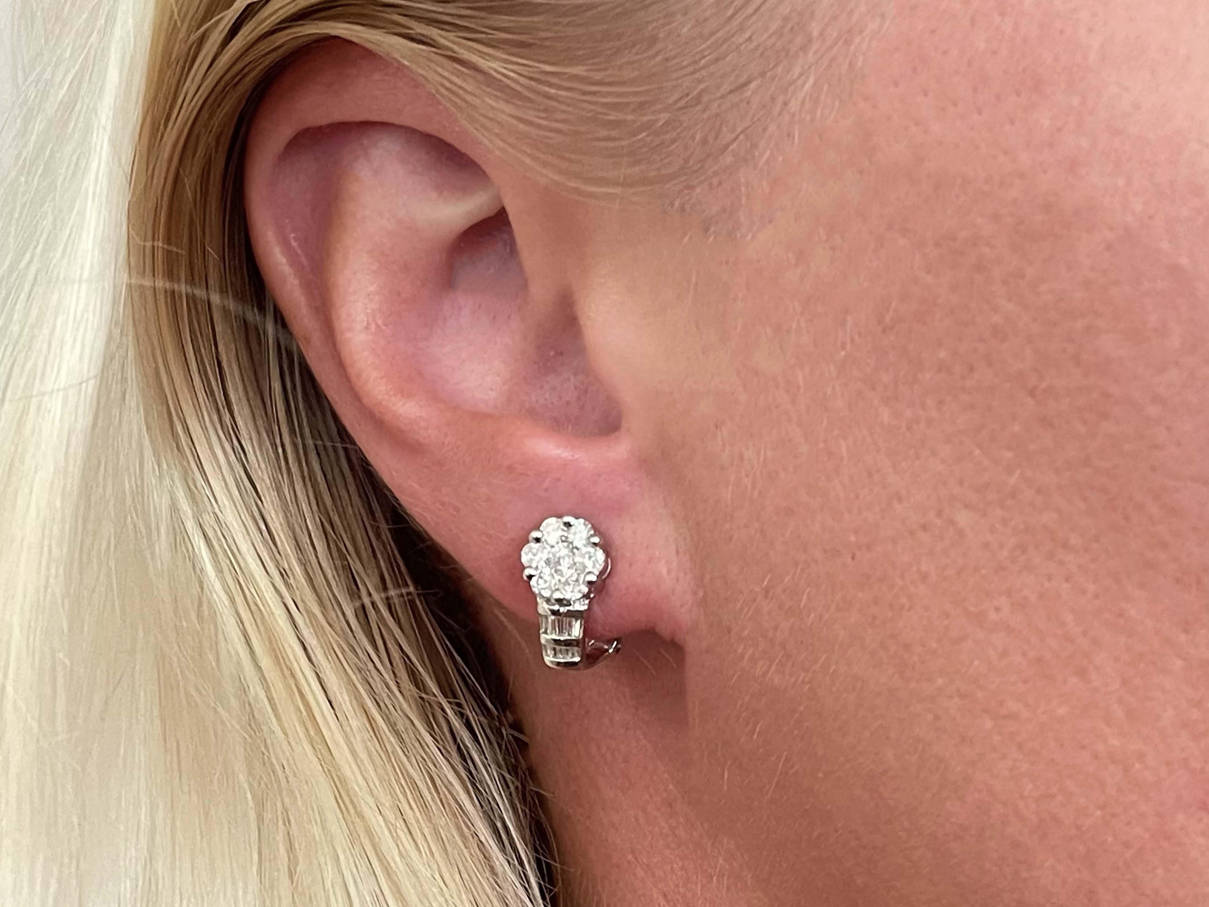 Earrings Specifications:

Metal: 14k White Gold

Total Weight: 3.8 Grams

Earring Measurements: 14.9 mm long x 7.7 wide

​​Diamond Count: 14 Round brilliant , 18 baguettes
Diamond Setting: Prong and channel
Diamond Color: G-H

Diamond Clarity: