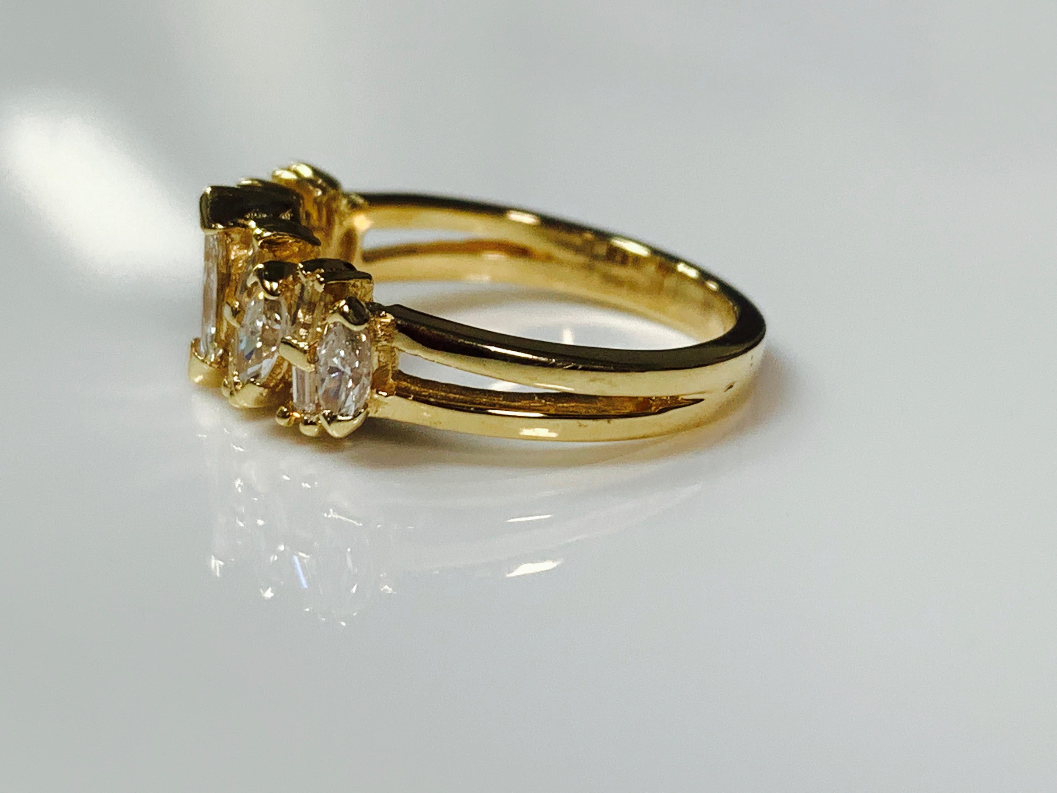 Baguette Cut Baguette and Round Brilliant Diamond Ring in 14 Karat Yellow Gold For Sale