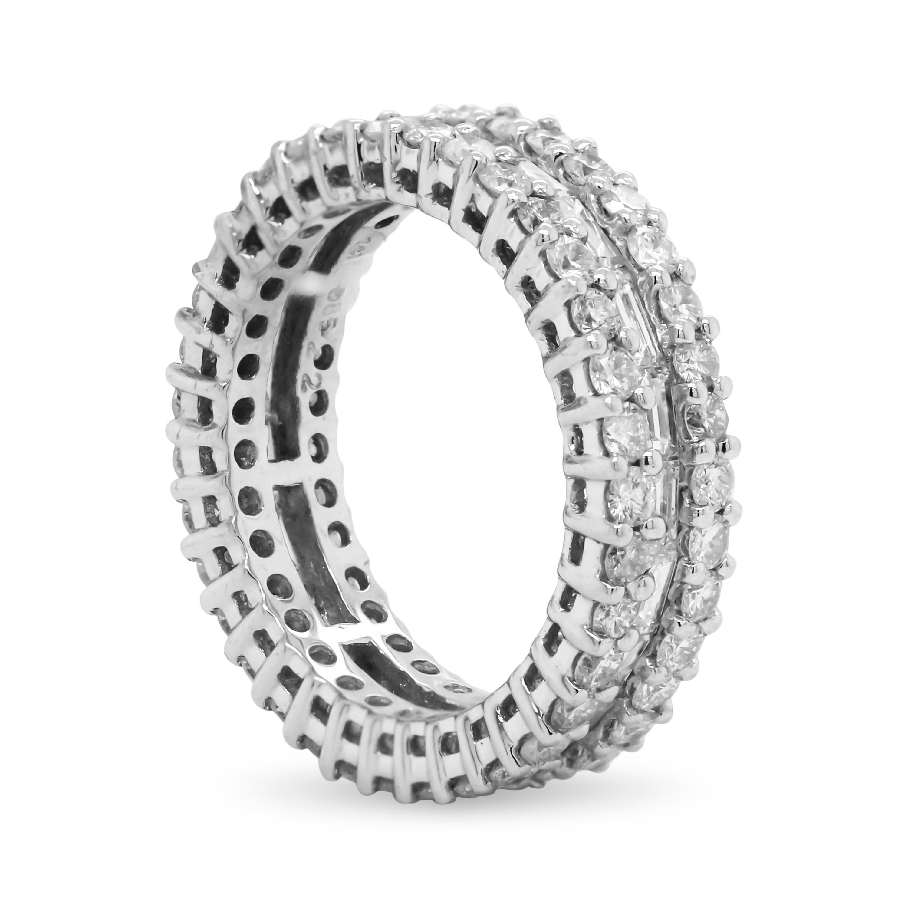 14k White Gold Eternity Band with Round and Baguette Diamonds

Apprx. 2.80 carat H color, SI Clarity diamonds total weight

6mm band width.

Size 6 