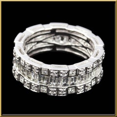 Baguette and Round Diamond Eternity Ring in 18 Karat Gold
