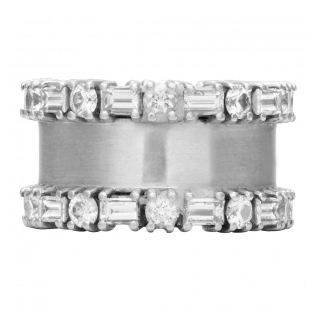 Baguette and round diamond eternity band in 18k white gold with 0.50 carats in round & 0.50 carats in baguette alternating diamonds. Width 11.8mm. Size 5.75.

