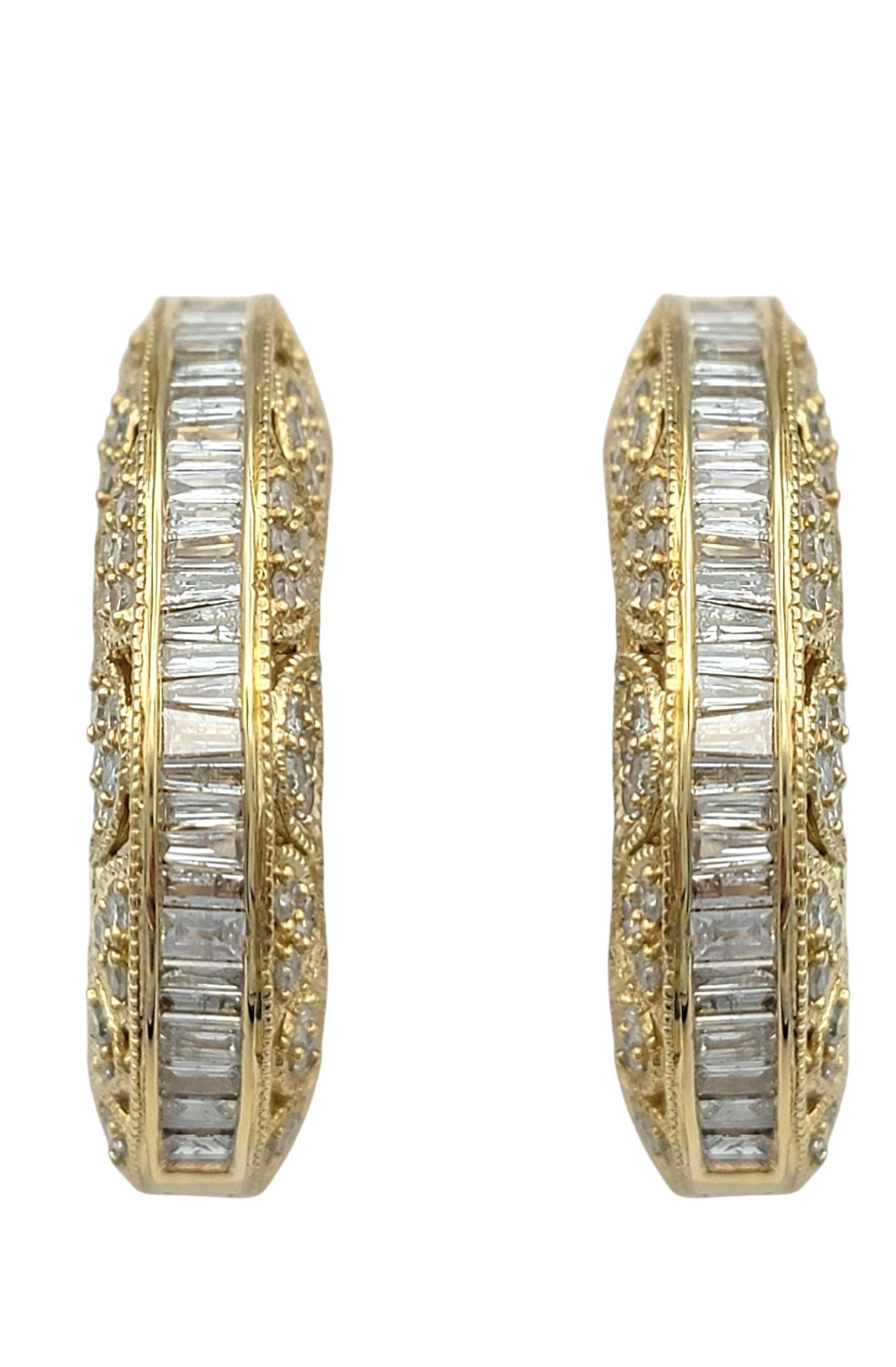 These elegant diamond hoop earrings radiate sophistication with a striking mix of round and baguette-cut diamonds. The diamonds are channel set in a sleek linear design, giving the hoops a structured sparkle and refined geometry.

Crafted in 14