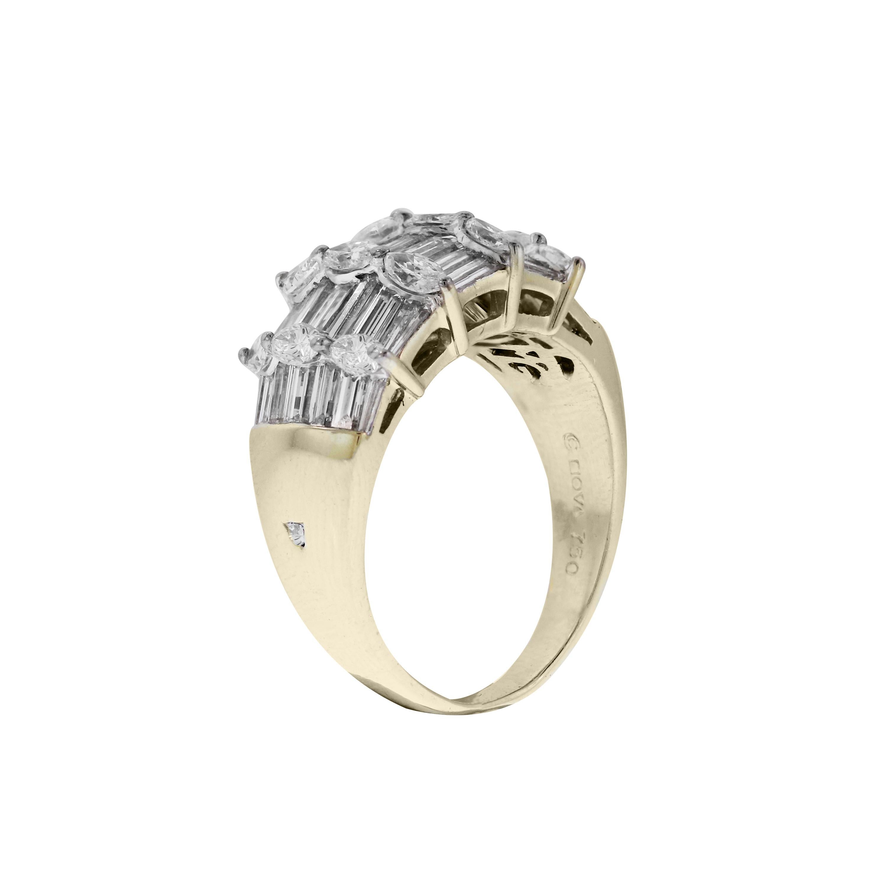 18K Yellow Gold Ring with Baguette and Round Diamonds

Apprx. 3 carat G color VS clarity Baguette and Round diamonds total weight

Ring face is 0.45 inch width and 6mm band width

Ring is a size 9.25. Sizable