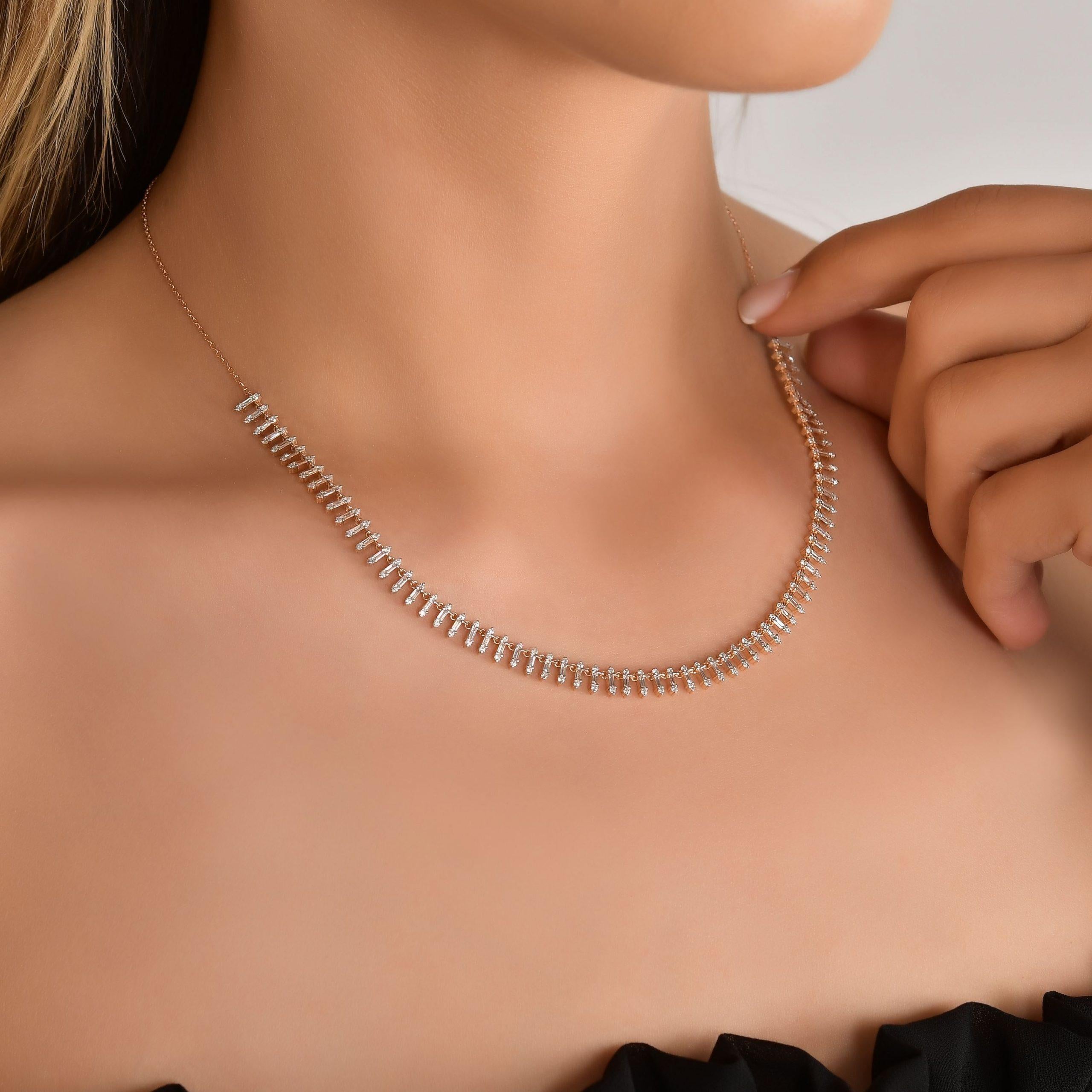 The Baguette Diamond Queen Necklace is unlike any necklace you already own, boasting 174 exquisite baguettes and round diamonds.

Carat Weight:	0,86ct Round Diamond 	Color: E Clairty: SI - .73ct Baguette Diamond Color: E	Clairty: VS
Metal Type:	14KT