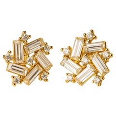 Baguette and round moissanite 14 gold earrings studs.