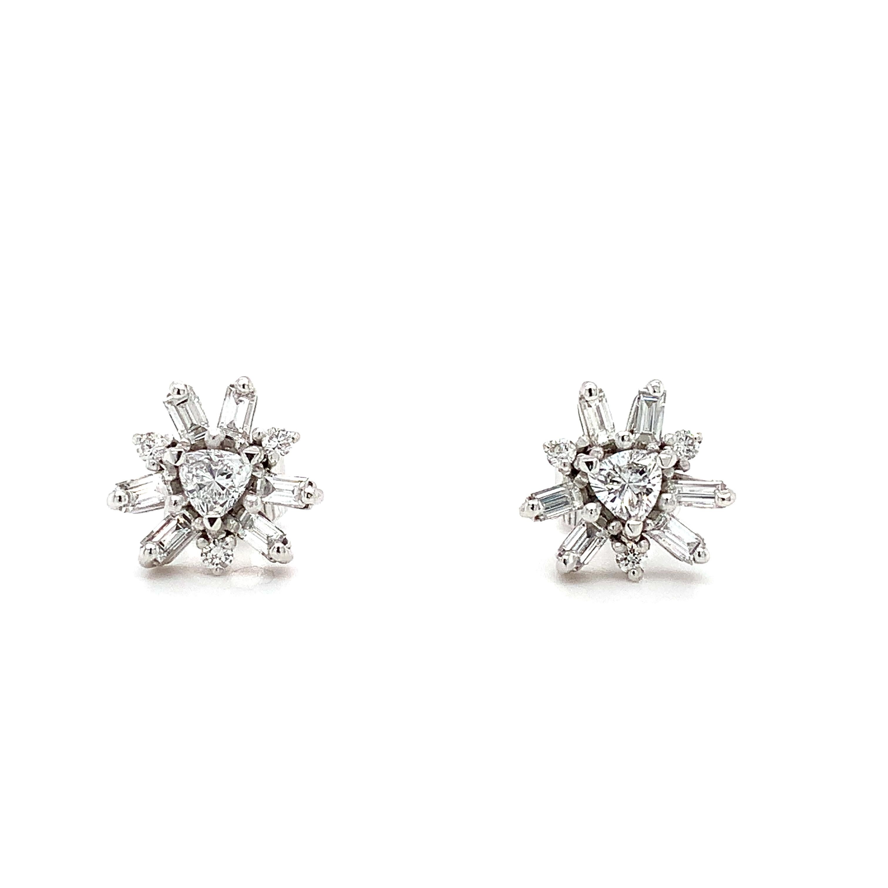 Beautiful diamond art deco style earrigns flower shaped with baguette, trillion and round brilliant diamonds in platinum.
Total diamond weight 0.90ct 
Baguette diamonds F colour VS1 clarity total weight 0.50ct
Trillion cut diamond F colour VS1