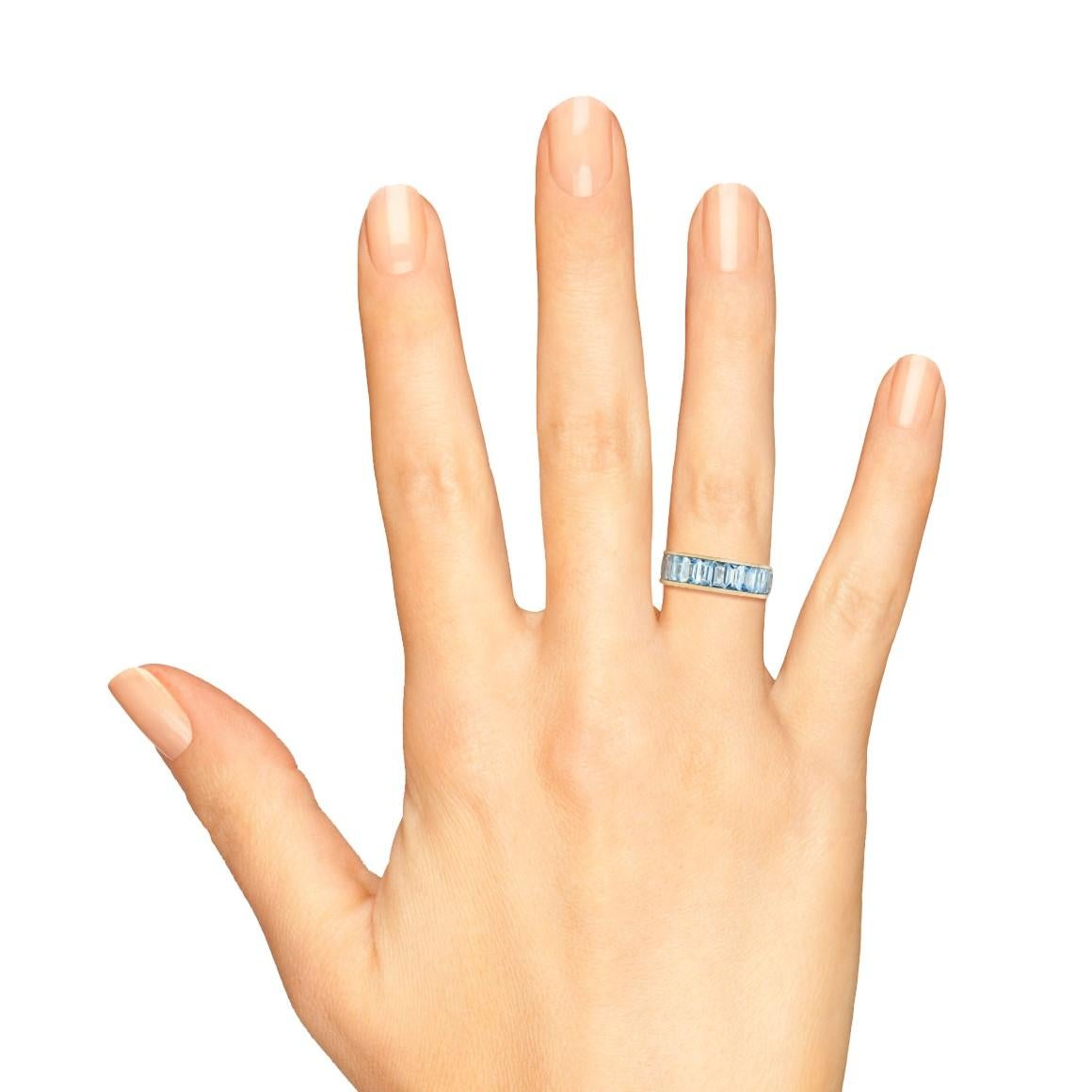 blue topaz and diamond eternity ring