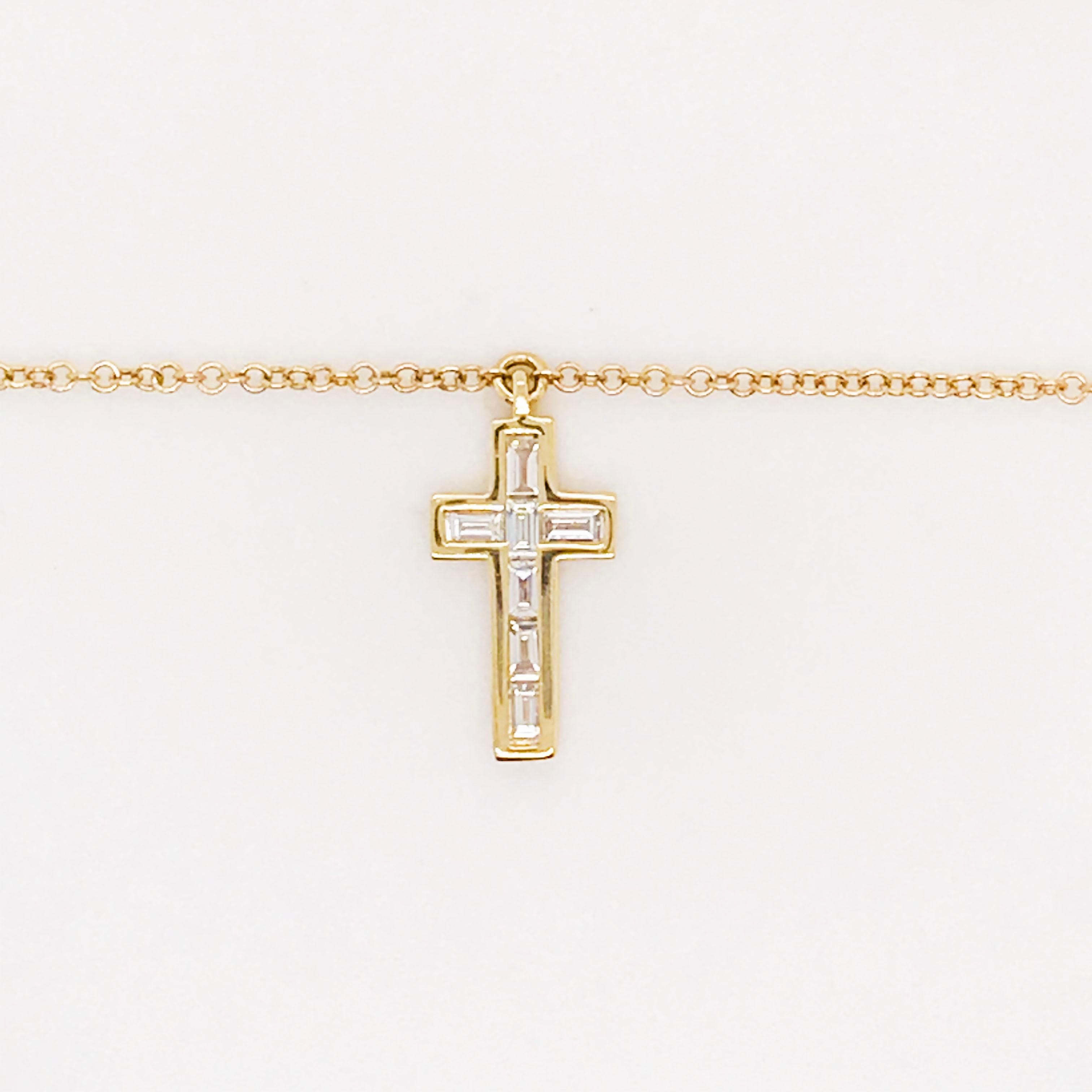 This original mini cross has baguette diamonds that are channel set and all handcrafted in beautiful 14 karat yellow gold.  The cross is 1/2 inch long and attached to a one millimeter cable chain that is adjustable to 18 inches, 17 inches, 16