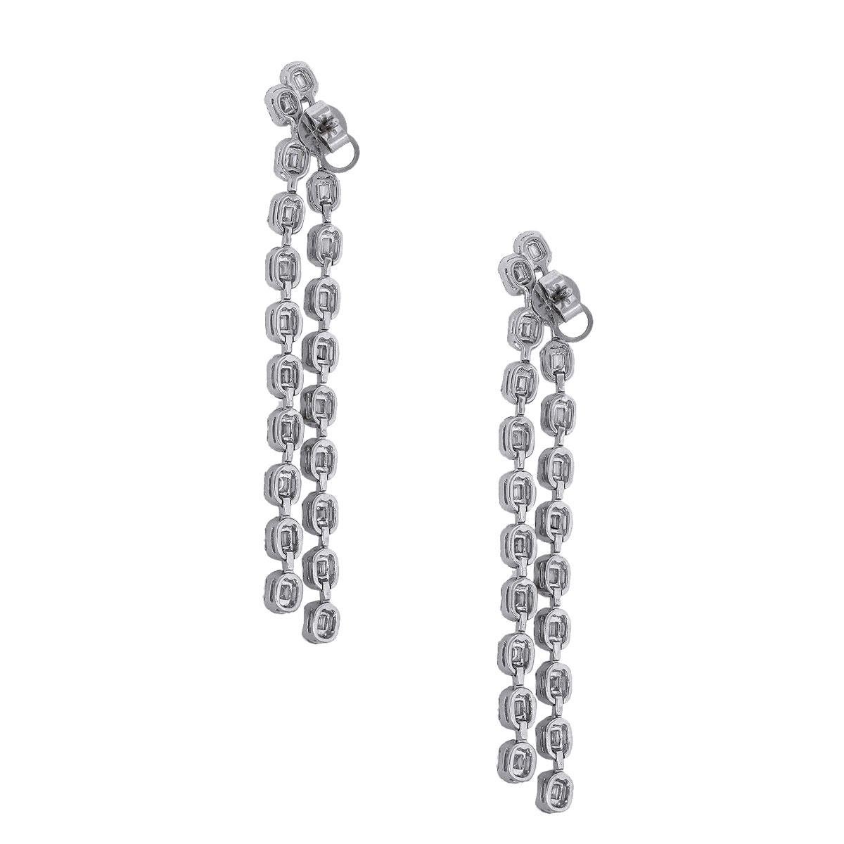 Material: 18k white gold
Style: Drop earrings
Diamond Details: Approximately 7.25ctw baguette cut diamonds. Diamonds are G in color and VS in clarity.
Earring Measurements: 0.60″ x 0.30″ x 3
Total Weight: 18.3g (11.8dwt)
Clasp: Tension