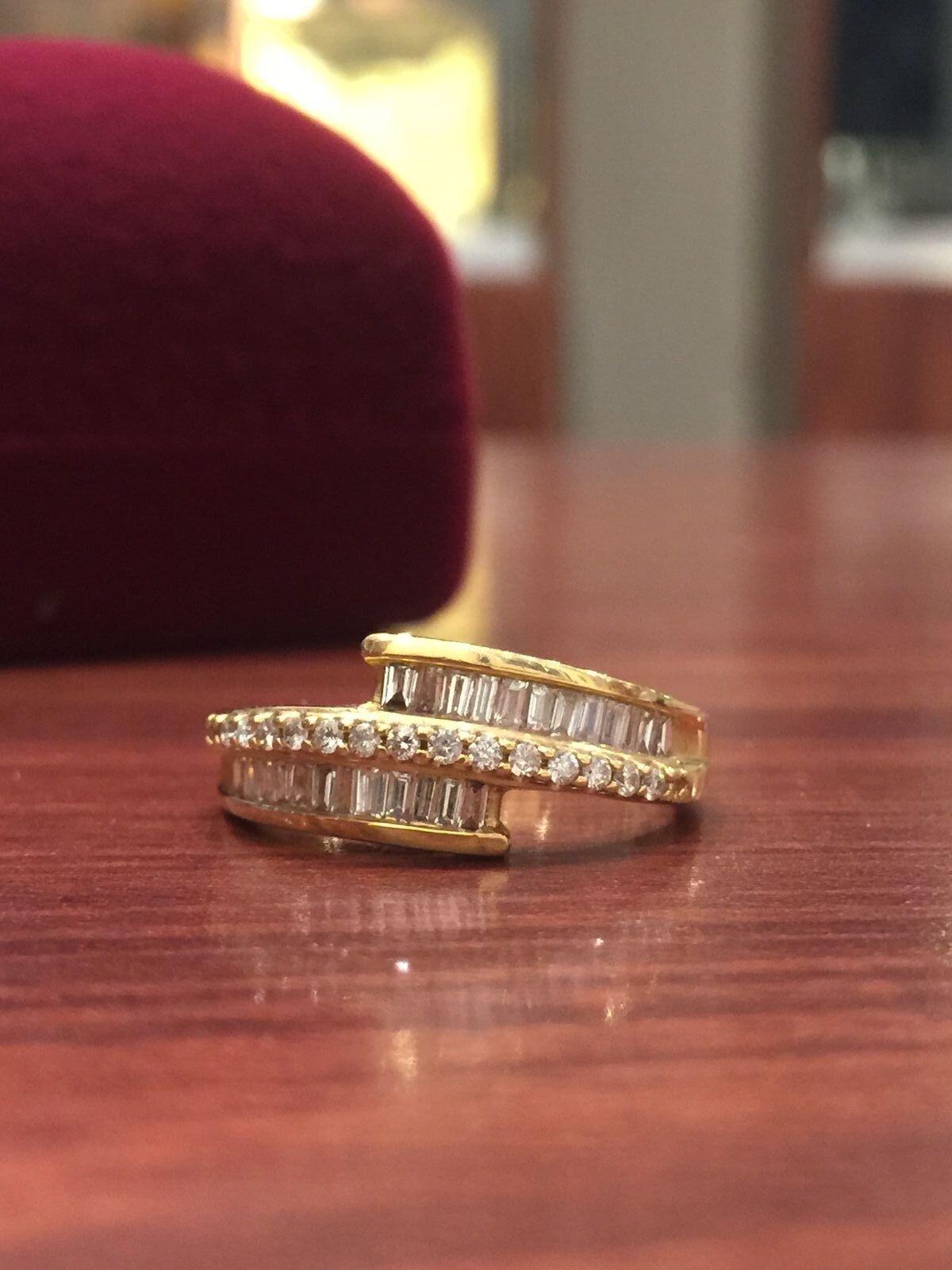 Round Cut Baguette Cut Diamond Dress Ring in 18K Yellow Gold. Diamonds' weight: 1.25ct.