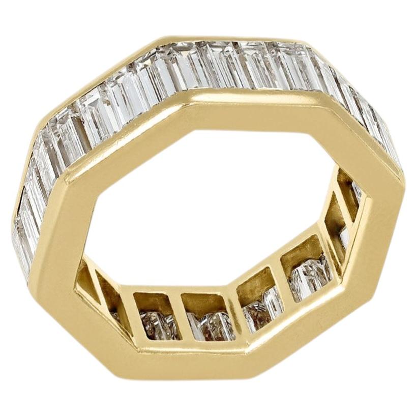 Baguette cut diamond eternity ring, circa 1970. For Sale