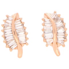 Boucles d'oreilles feuilles en or rose 18 carats avec diamants taille baguette