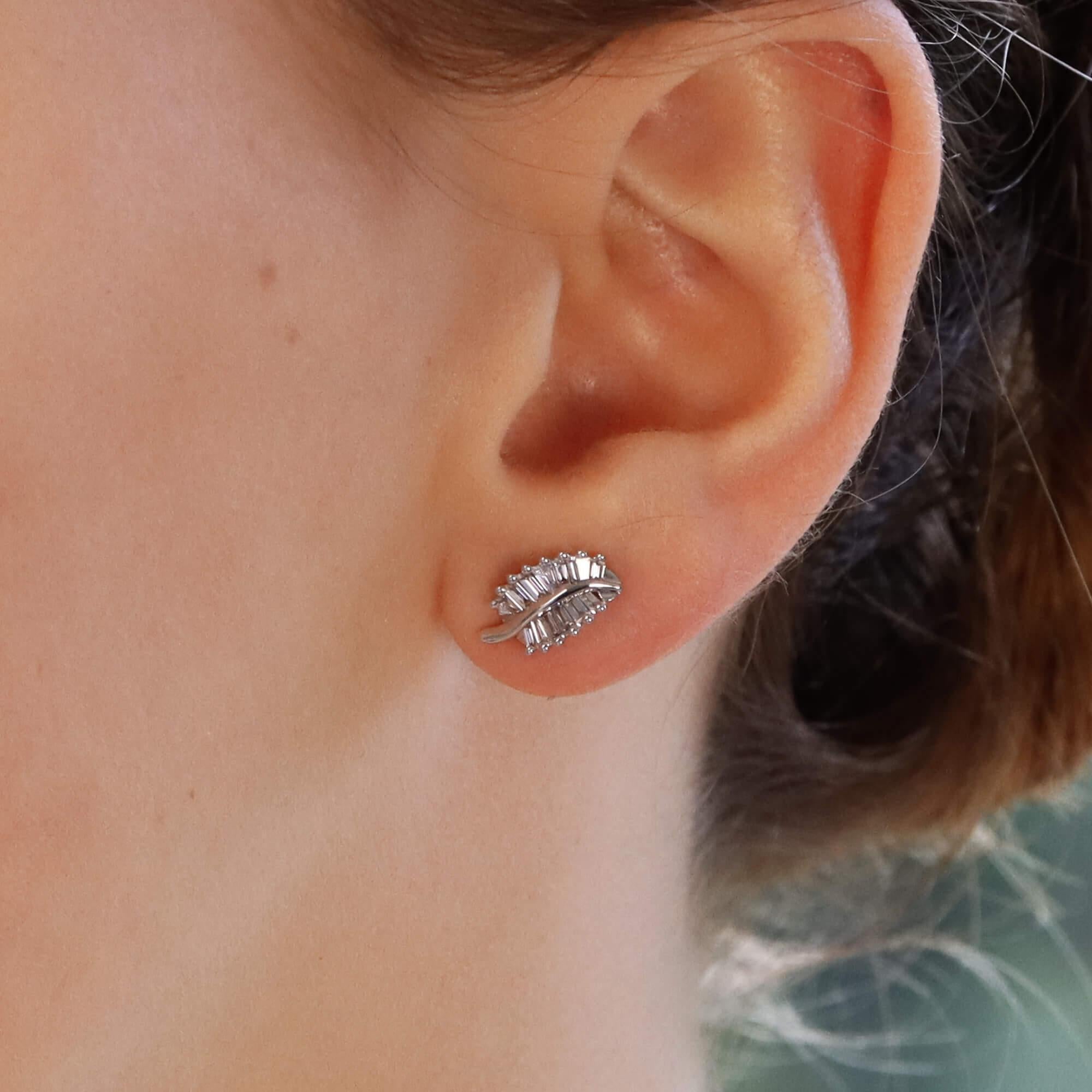 Modern Baguette Cut Diamond Leaf Stud Earrings Set in 18 Karat White Gold For Sale