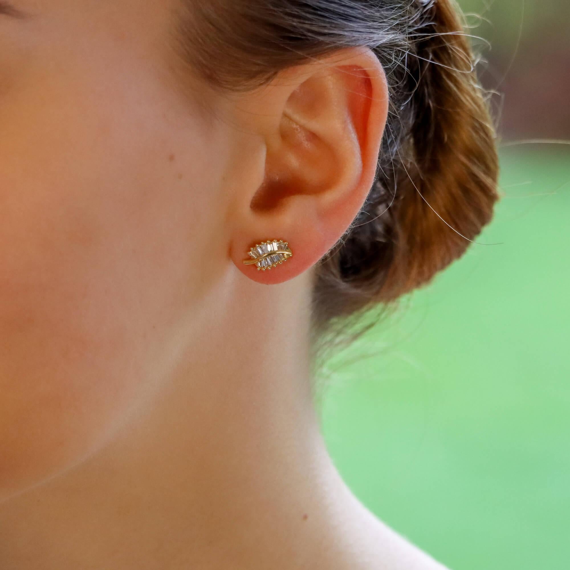 Baguette Cut Diamond Leaf Stud Earrings Set in 18 Karat Yellow Gold For Sale 1