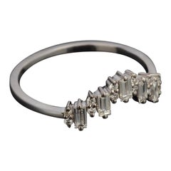 Moissanit-Ring 925 mit Baguetteschliff und geschwungenem Ehering aus Sterlingsilber für Damen.