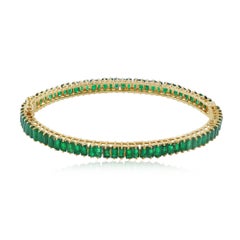 Hochzeitsarmreif aus 14-karätigem Gelbgold mit einem natürlichen Smaragd im Baguette-Schliff – edler Schmuck