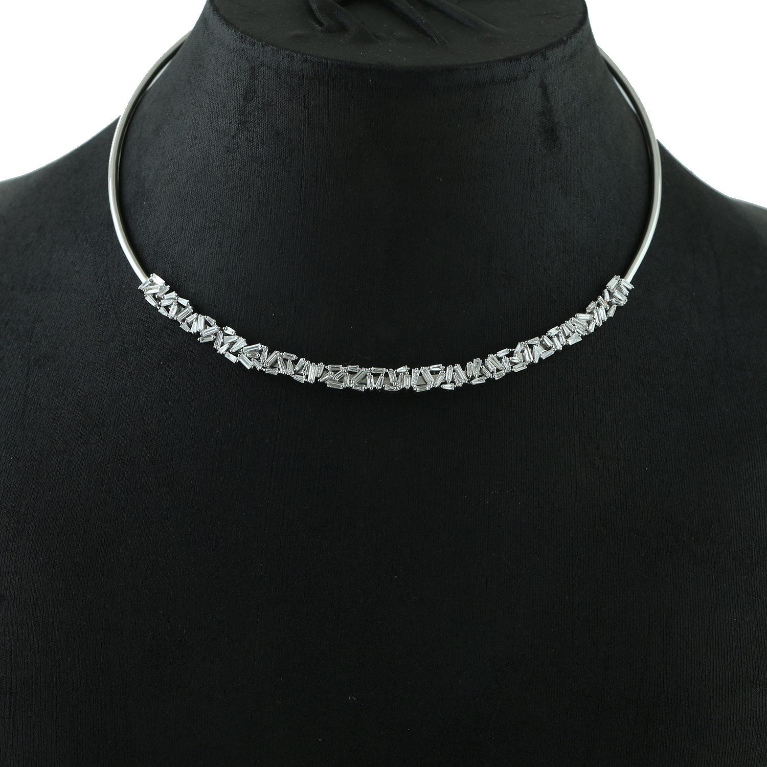 Cast in 14 karat gold, this stunning choker necklace is hand set in 3.48 carats baguette cut diamonds. Also available in yellow and white gold.

FOLLOW  MEGHNA JEWELS storefront to view the latest collection & exclusive pieces.  Meghna Jewels is