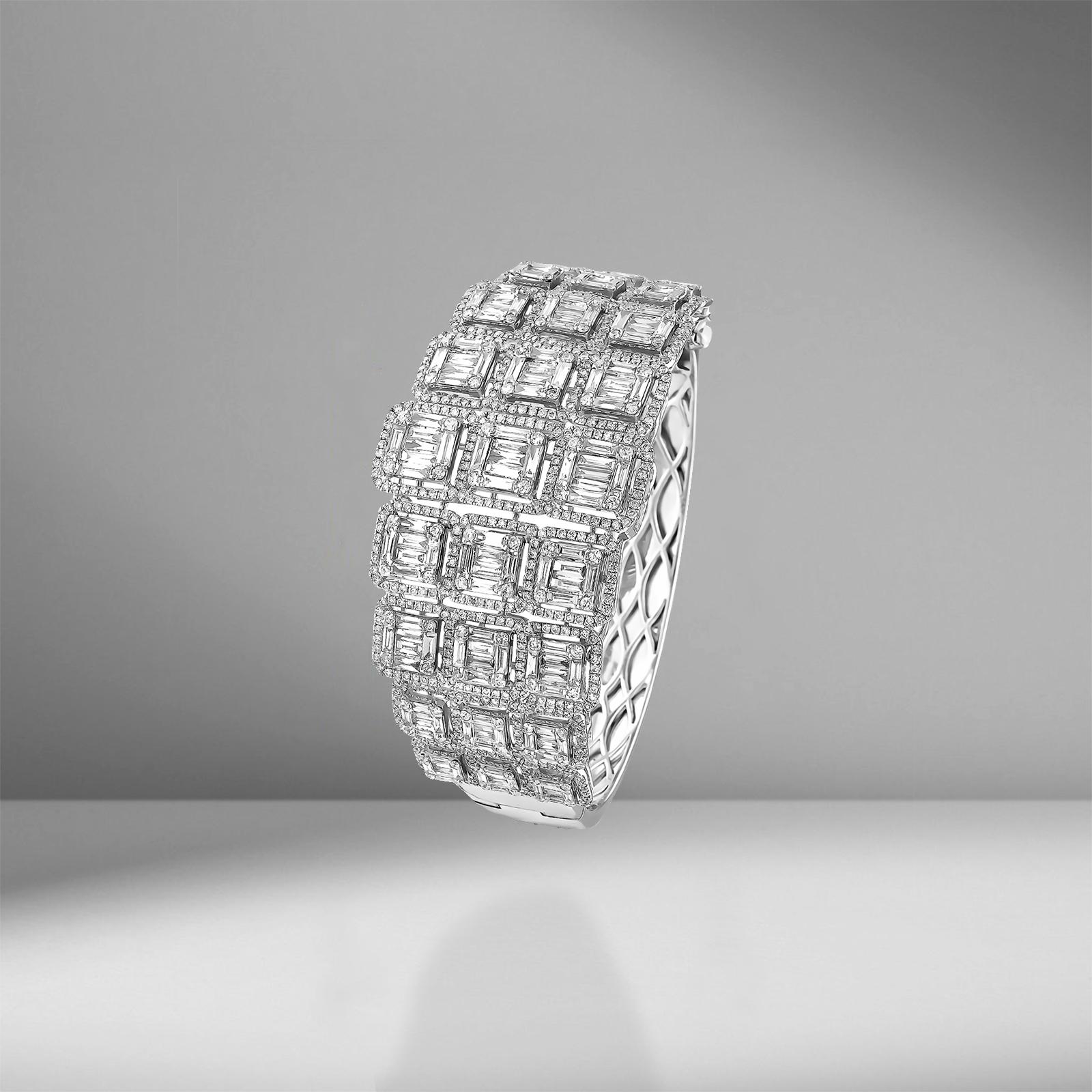 Baguette Diamond Clamper Bracelet Will Add a Luxurious Touch to Your Look. 

The bracelet features 7.04 ctw. of VS Baguette Diamonds. 
18 Karat White Gold Weighs 41.25 grams. 

Have you heard of the baguette-cut diamond? It’s not a diamond-cut you