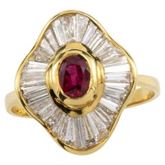 Ring mit Baguette-Diamant und Rubin aus 18 Karat Gold