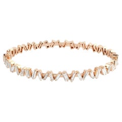 Bracelet jonc en or rose 14 carats avec diamants baguettes