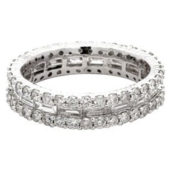 Centre en diamant baguette et bagues en diamant taillé en brillant Or blanc 18k