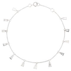 Bracciale charme con diamanti a baguette in oro bianco 18 carati