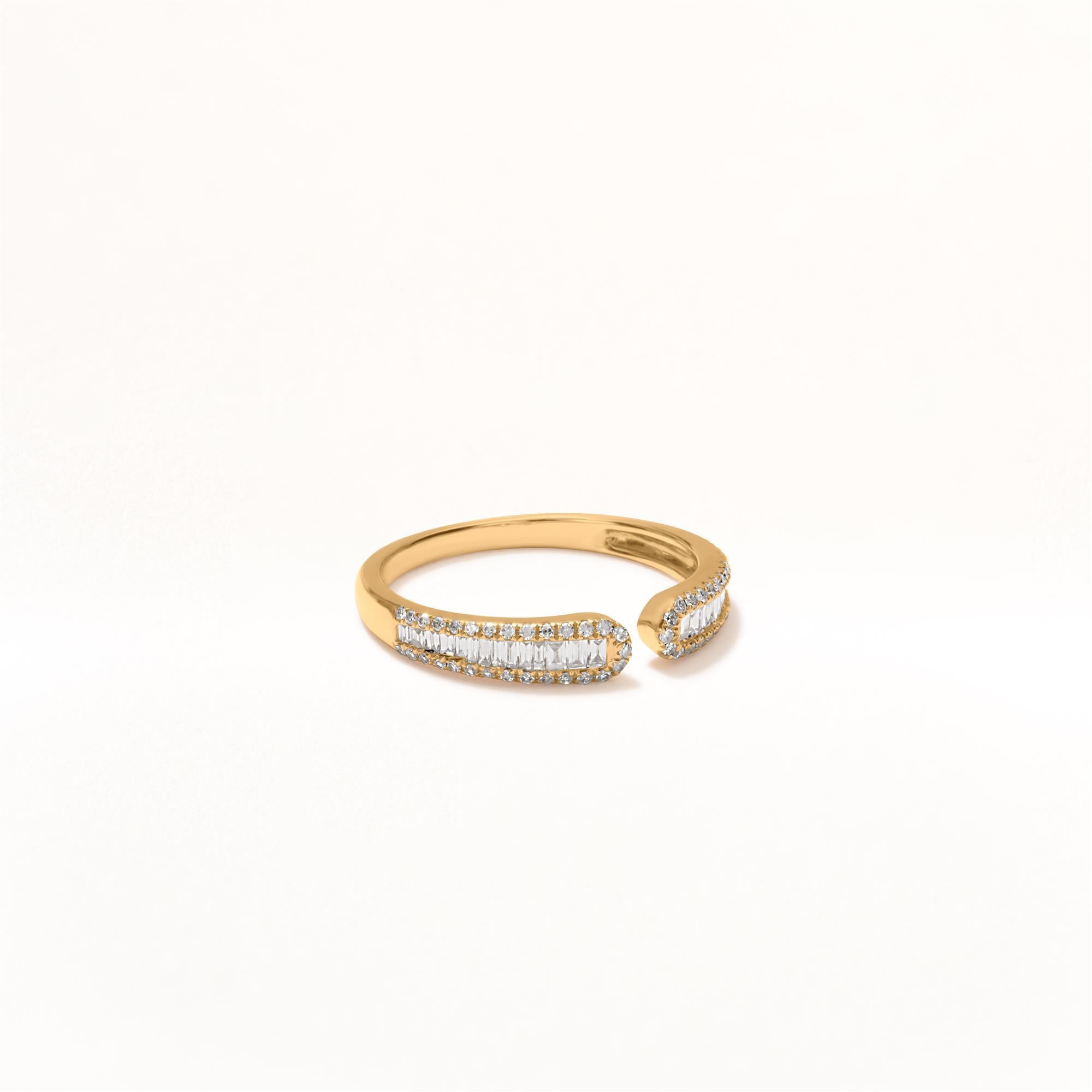 The 14K Yellow Gold cuff ring is well decorated with diamonds by Luxle. It has Round and baguette full-cut white diamonds studded in it beautifully. The diamonds are GH in color and SI1 in clarity. The total weight of the diamonds in this cuff ring