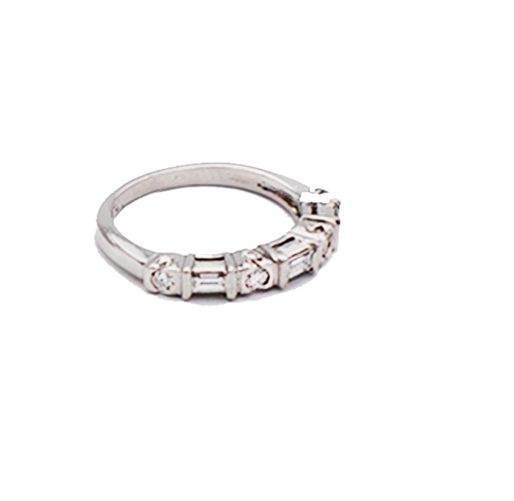 Platinum, Engagement 3mm Band
 Size 5.25

Band width is 3 mm and consists of alternating round and baguette diamonds. 

Ring consists of (4) round 2.6 mm diamonds with a total weight of .25 carat and alternating (3) straight baguette which are .25