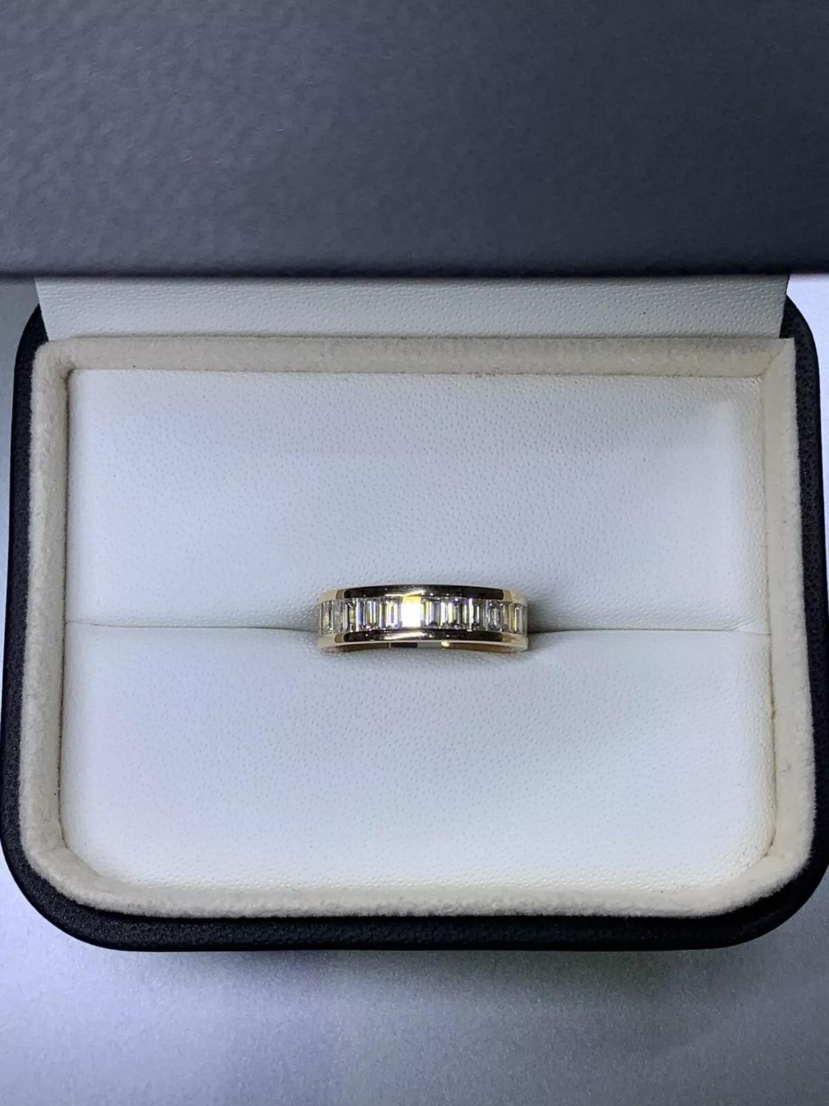 Baguette diamond full eternity engagement ring in 18k pink rose gold.