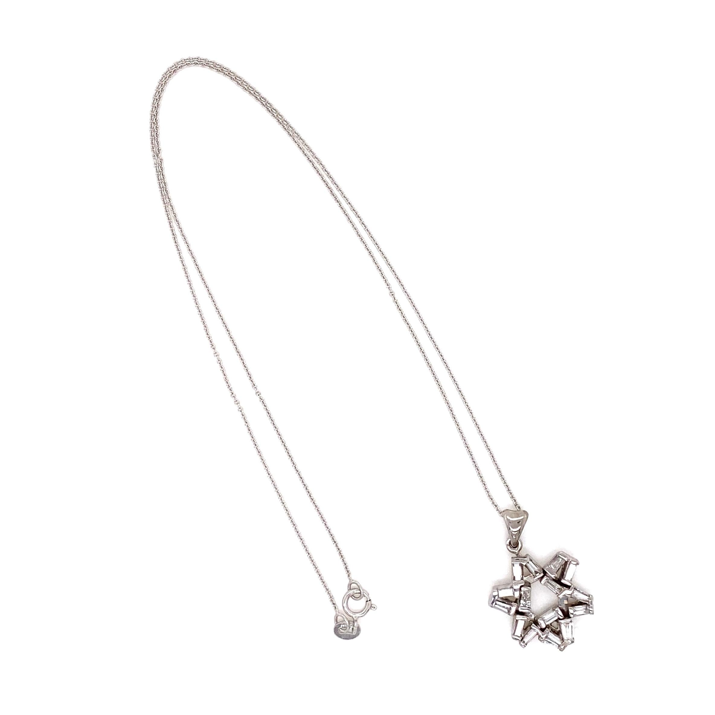 Simply Beautiful and Finely Detailed Diamond Six-pointed Star of David Pendant, Hand set with 15 Baguette Diamonds, weighing approx. 0.70tcw. Hand crafted in 14K White Gold. The Cross, measures approx. 0.95” tall x 0.66” wide x 0.11” deep; suspended