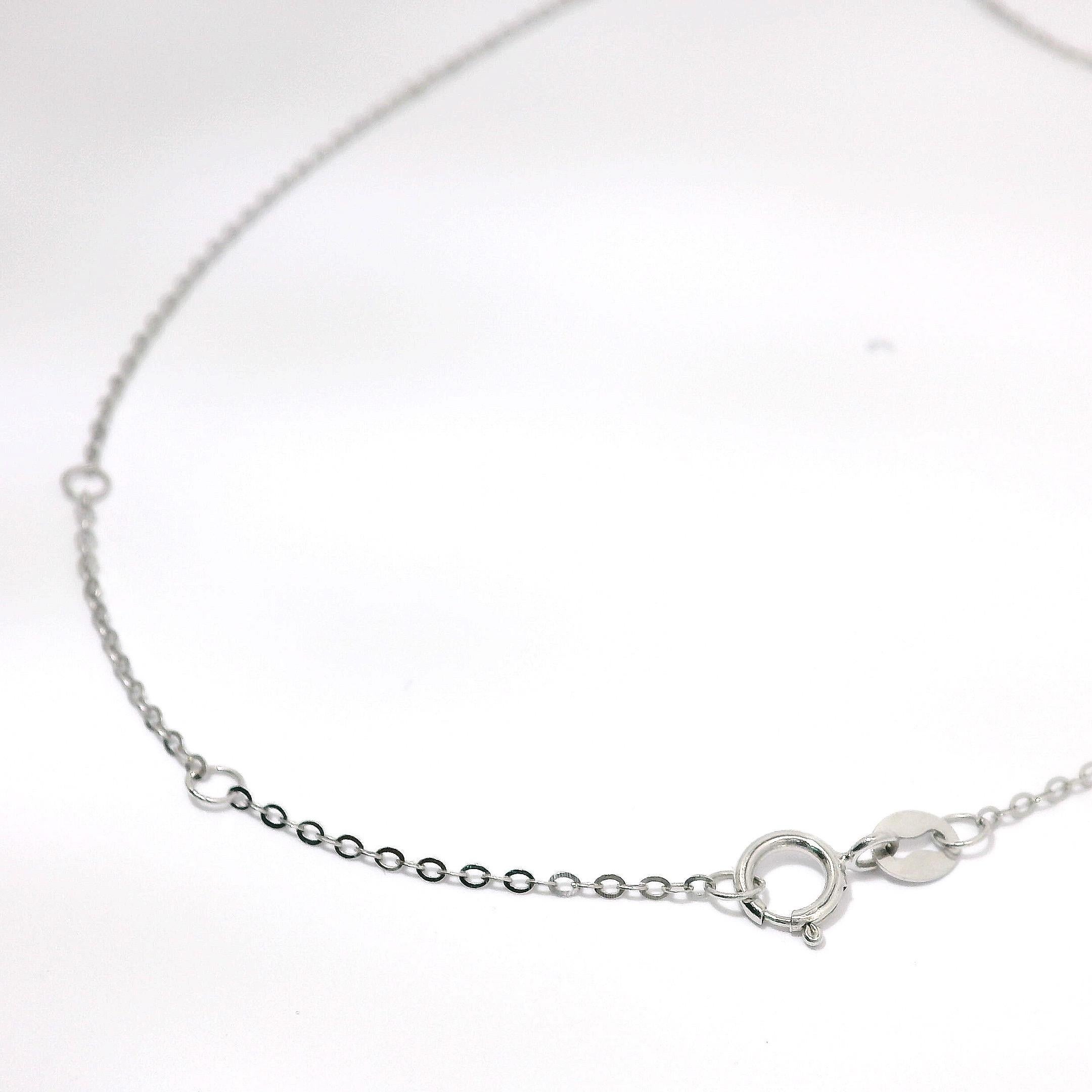 Taglio baguette Ciondolo a forma di cuore con diamante baguette e catena in oro bianco 18 carati in vendita