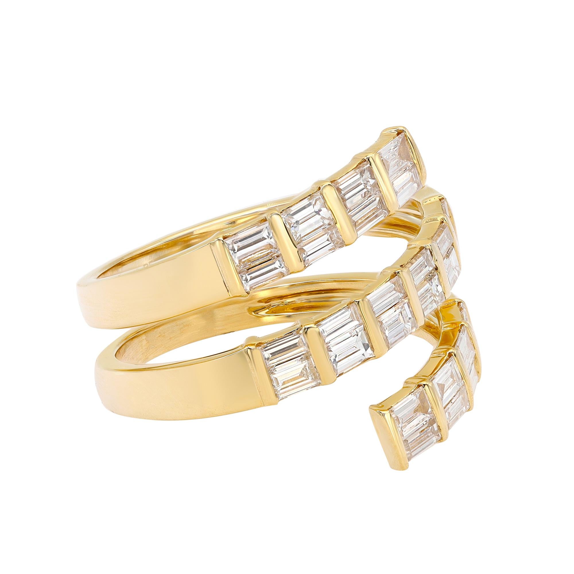 This beautiful spiral diamond ring is all about sparkle. Crafted in high polished 18k yellow gold. This style features multi rows of baguette cut shimmering diamonds in channel setting. Total diamond weight: 1.20 carats. Diamond quality: G-H color