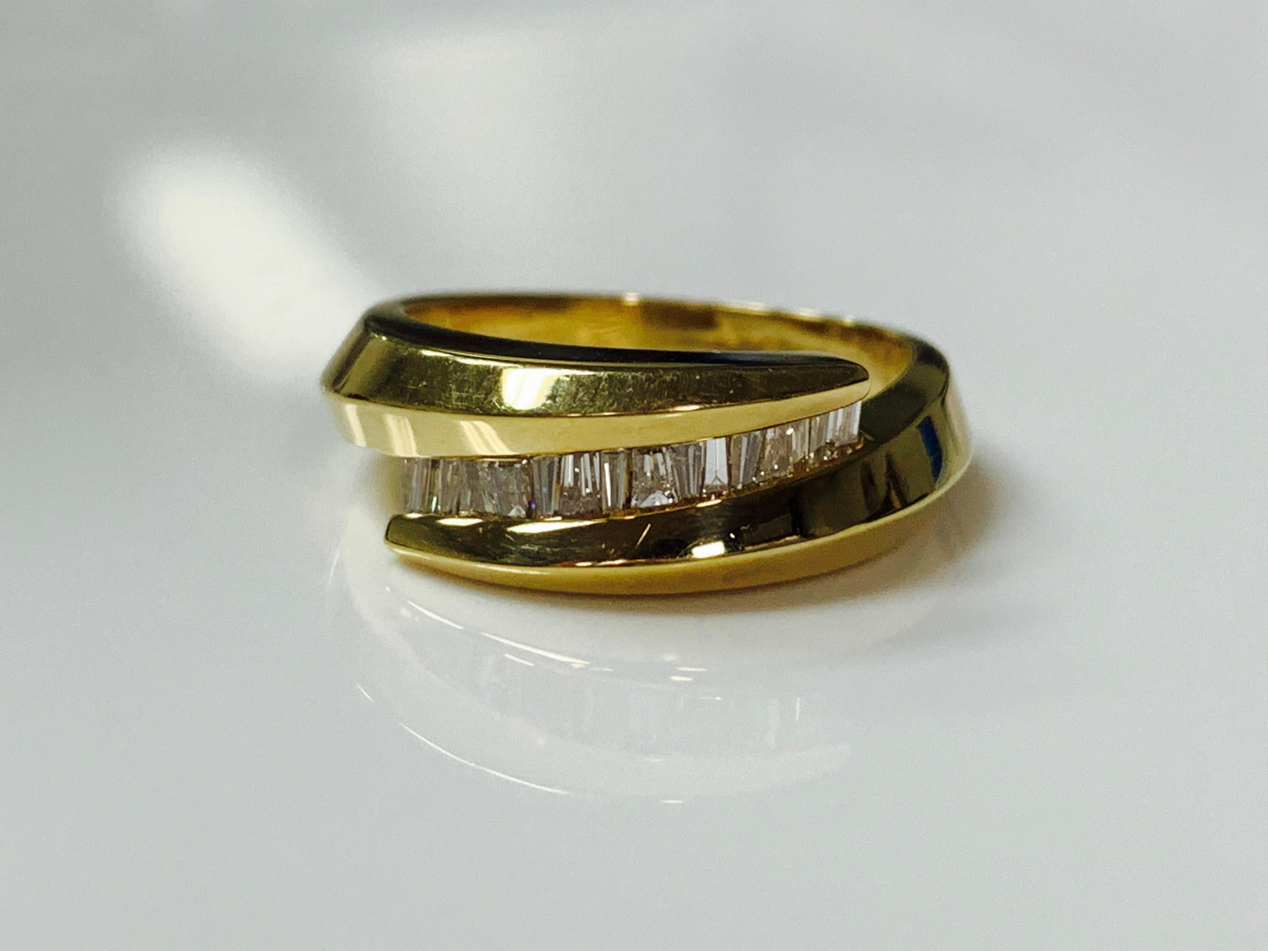 Beautiful Baguette diamond Ring handcrafted in yellow gold. 
The details are as follows : 
Diamond weight : 0.50 carat ( GH color and VS clarity ) 
Metal : 14 k yellow gold 
Ring size : 5 3/4 
