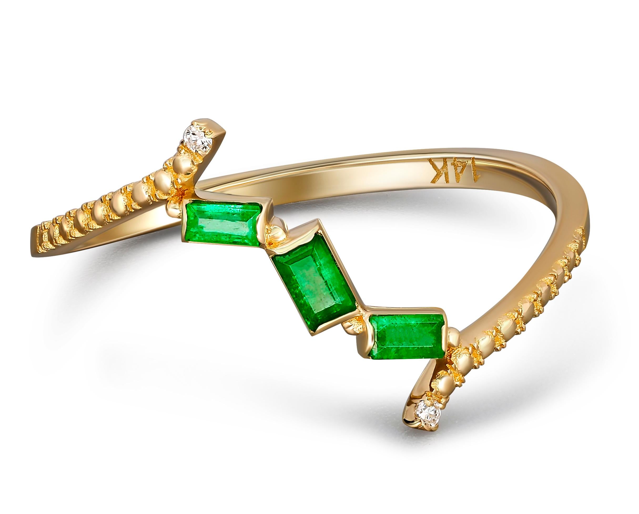 Baguette emerald 14k gold ring. 
Minimalist emerald ring. 3 gemstone ring. Delicate emerald ring. May Birthstone Ring. Casual emerald ring.

Metal: 14k gold
Weight: 1.3 g. depends from size.

Central stone: Emeralds - 3 pieces
Cut: Baguette
Weight: