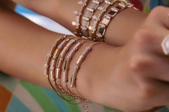 Baguette Jewellery 14K Yellow Gold Bar Bracelet with Diamonds and Ruby Cabochon