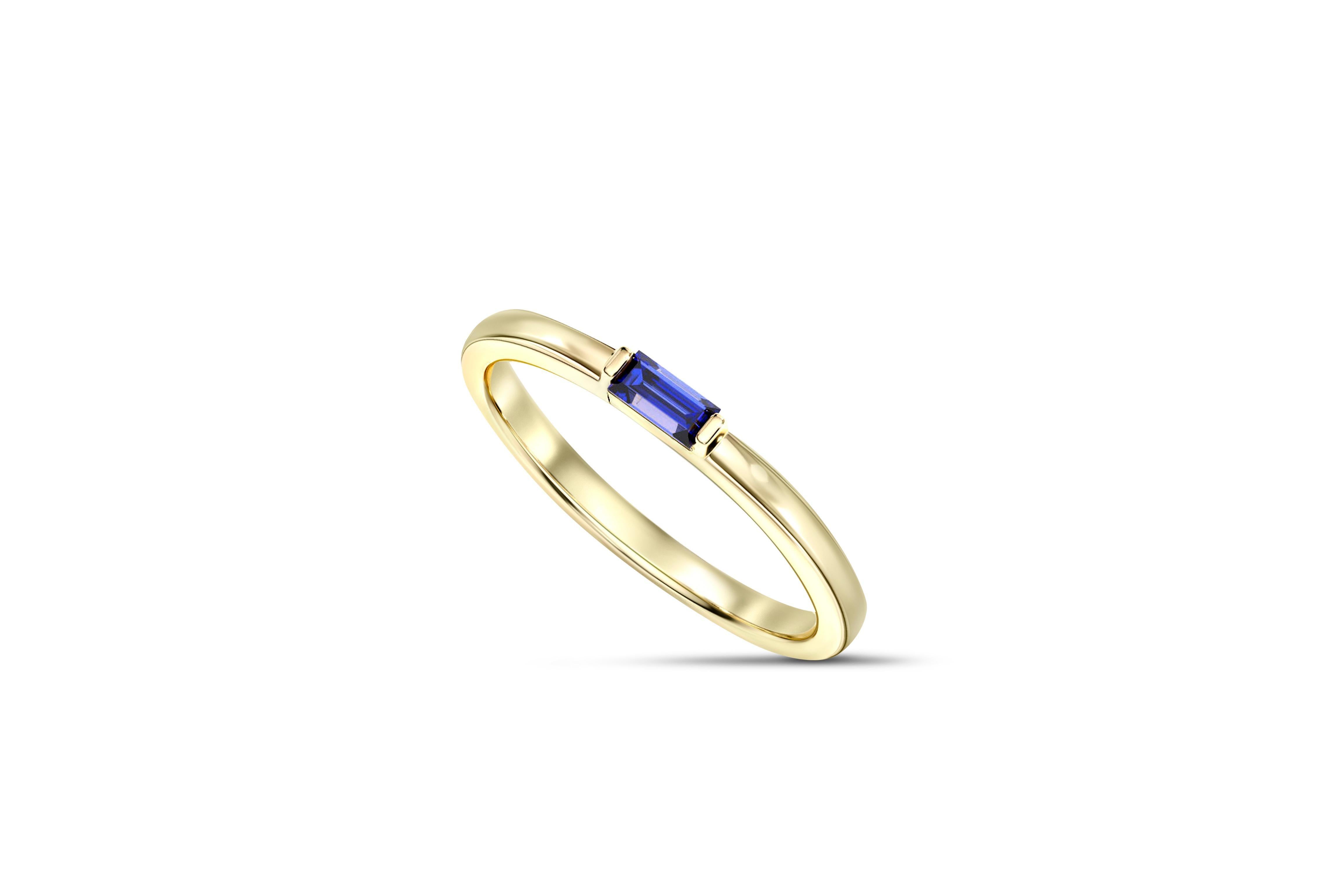 Baguette Cut Baguette lab sapphire 14k gold ring.