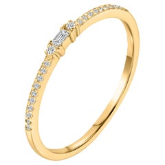 Bague jonc en or jaune 14 carats avec diamants baguettes