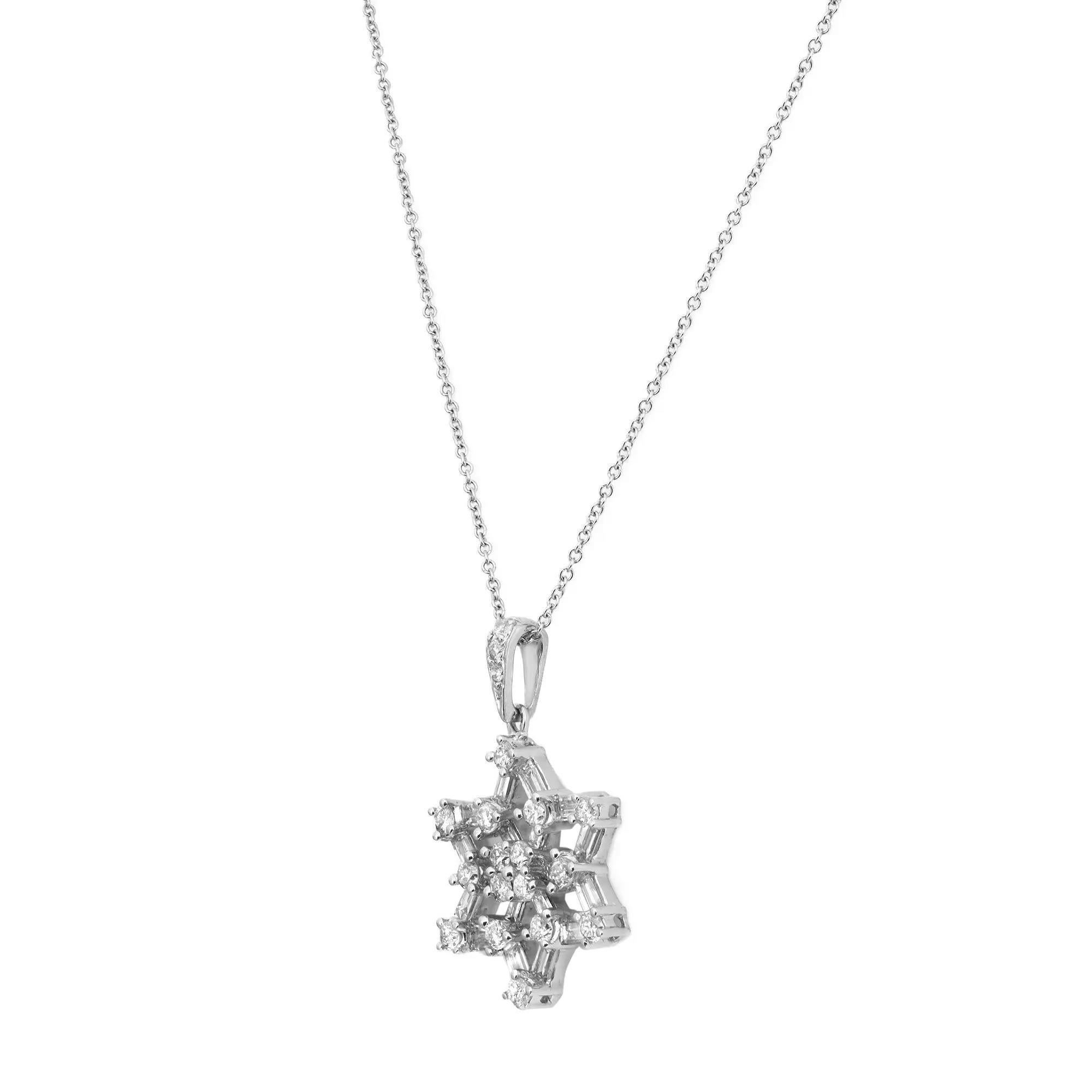 Beautiful and delicate this diamond pendant necklace will leave everyone speechless the moment they see it. Crafted in high polished 18k white gold. It features prong set baguette and round cut diamonds encrusted in a floral star shape with diamond