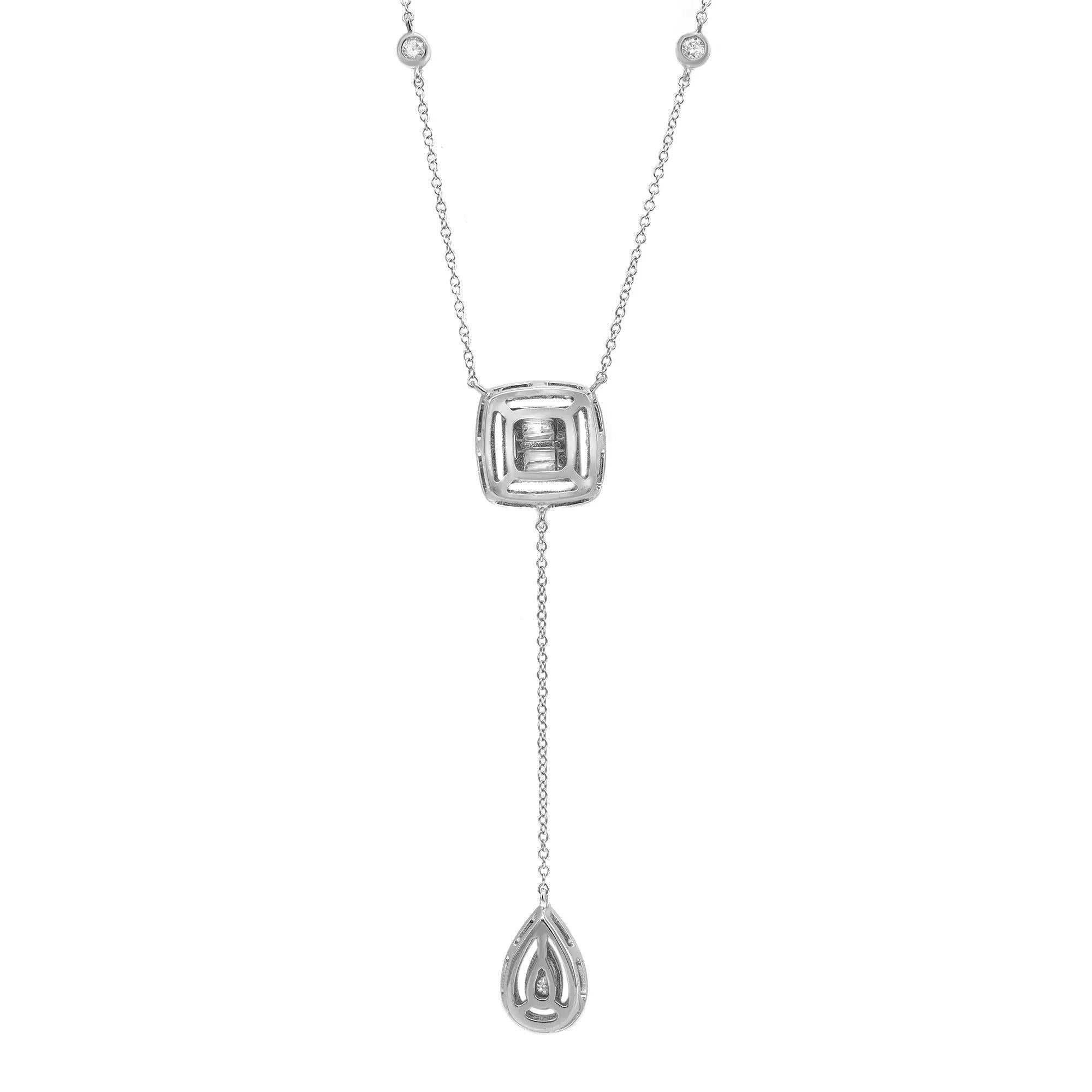 Dainty and pretty we know it will look wonderful for any occasion. Crafted in 14K White Gold. This beautiful diamond lariat necklace features a square shank pendant studded with baguette cut and round cut diamonds with a pear shape drop hanging