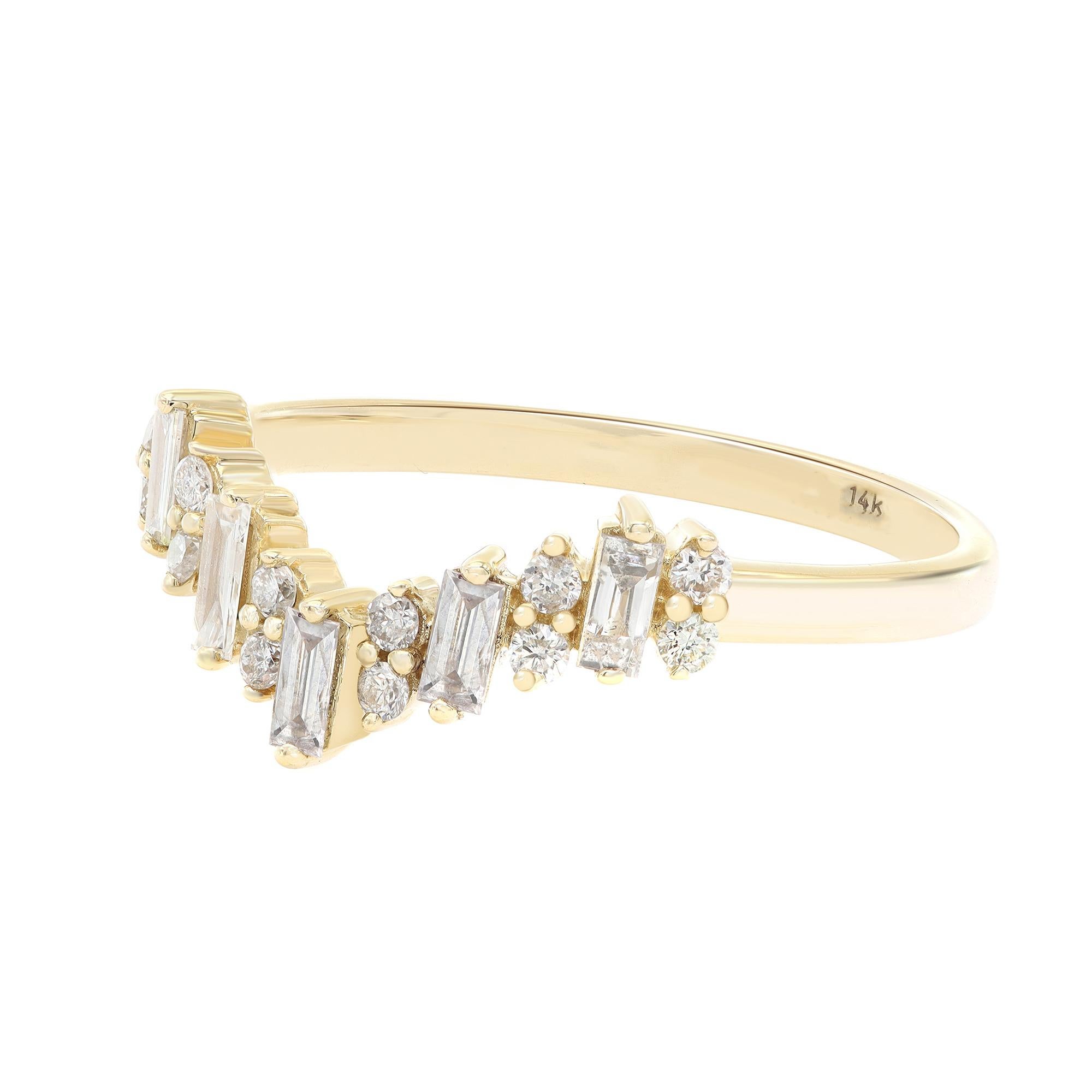 This beautiful and delicate diamond V shaped ring is a perfect fit for any occasion. Crafted in 14K yellow gold. Features 5 Baguette cut and 12 round cut diamonds in prong setting. The total diamond weight is 0.33cts. Diamond color G-H and Clarity