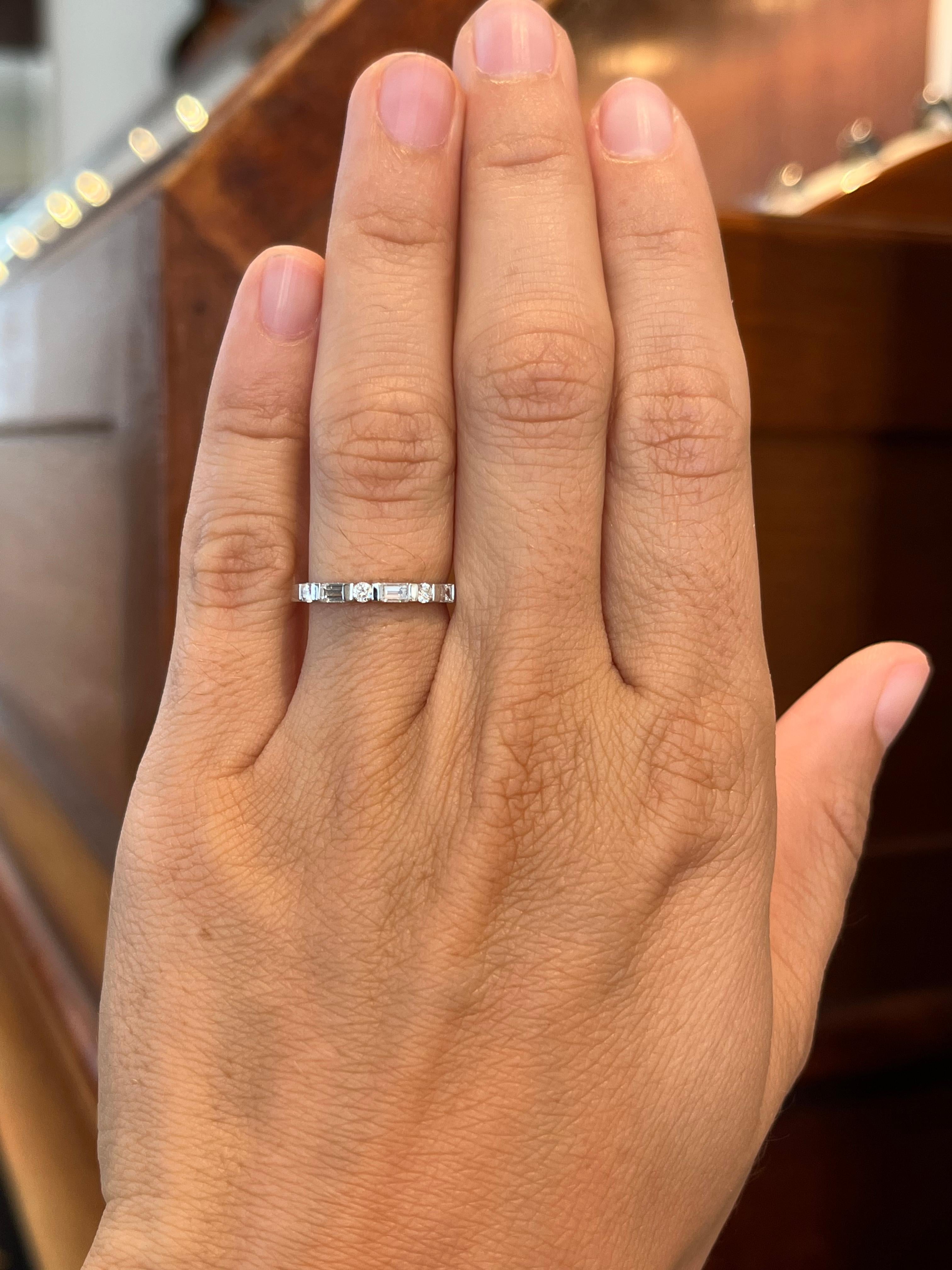 Crafted by Bracken Jewelers in Santa Monica, California. Baguette cut and round diamonds alternate in this 14K white gold half eternity wedding band. The stones are bar-set. Clean, classic, timeless.

- 3 baguette cut natural diamonds total 0.24ct
-
