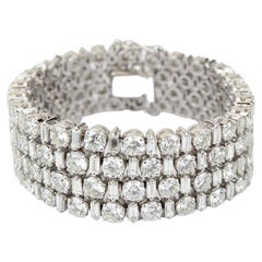 Bracelet tennis en or massif 18 carats avec diamants baguettes et ronds
