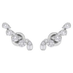 Boucles d
oreilles pendantes en or blanc 18 carats avec diamants baguettes et ronds, fabrication artisanale