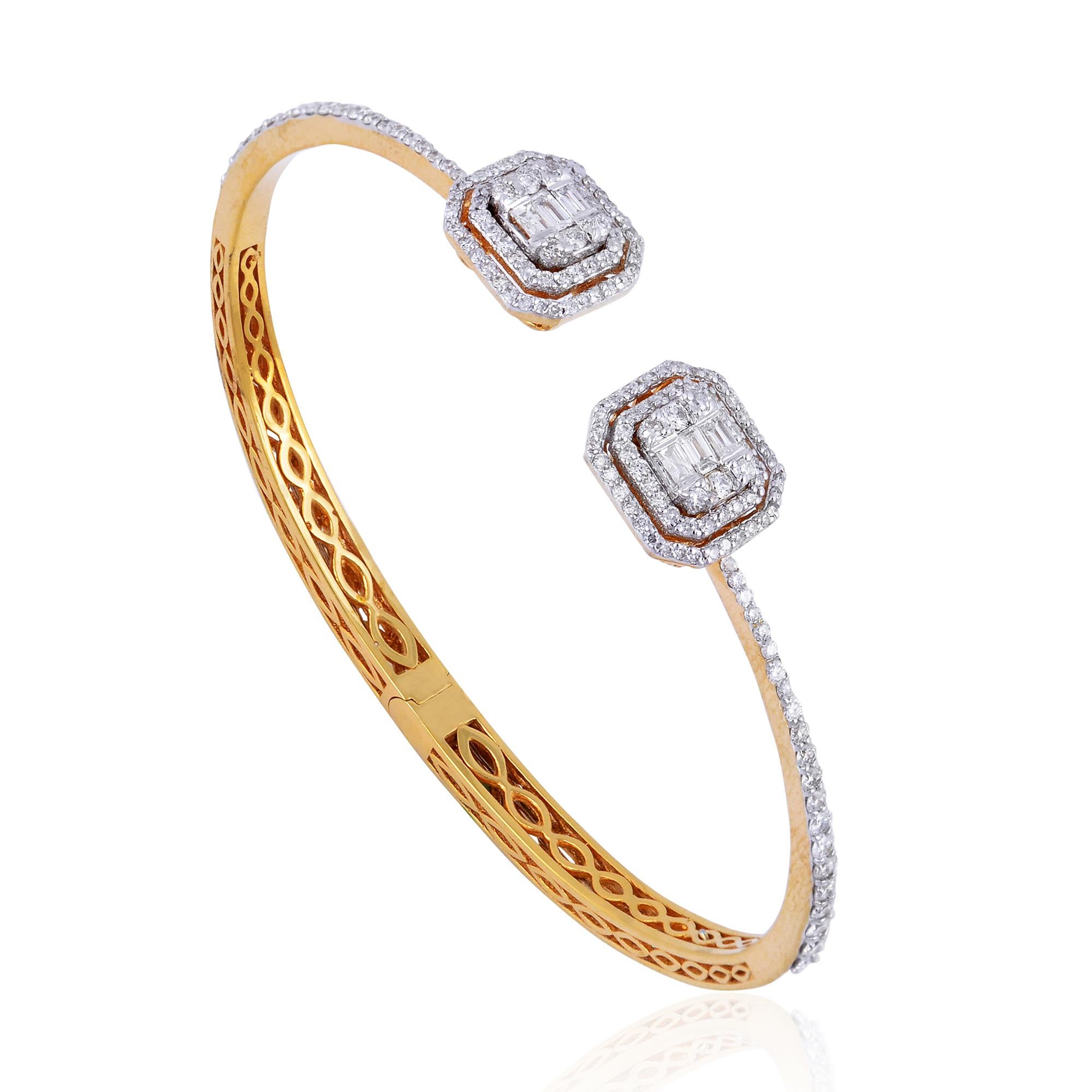Crafted with precision and attention to detail, this cuff bangle bracelet is designed to effortlessly grace the wrist with its sleek and sophisticated silhouette. The 14 karat yellow gold setting provides a warm and radiant backdrop for the