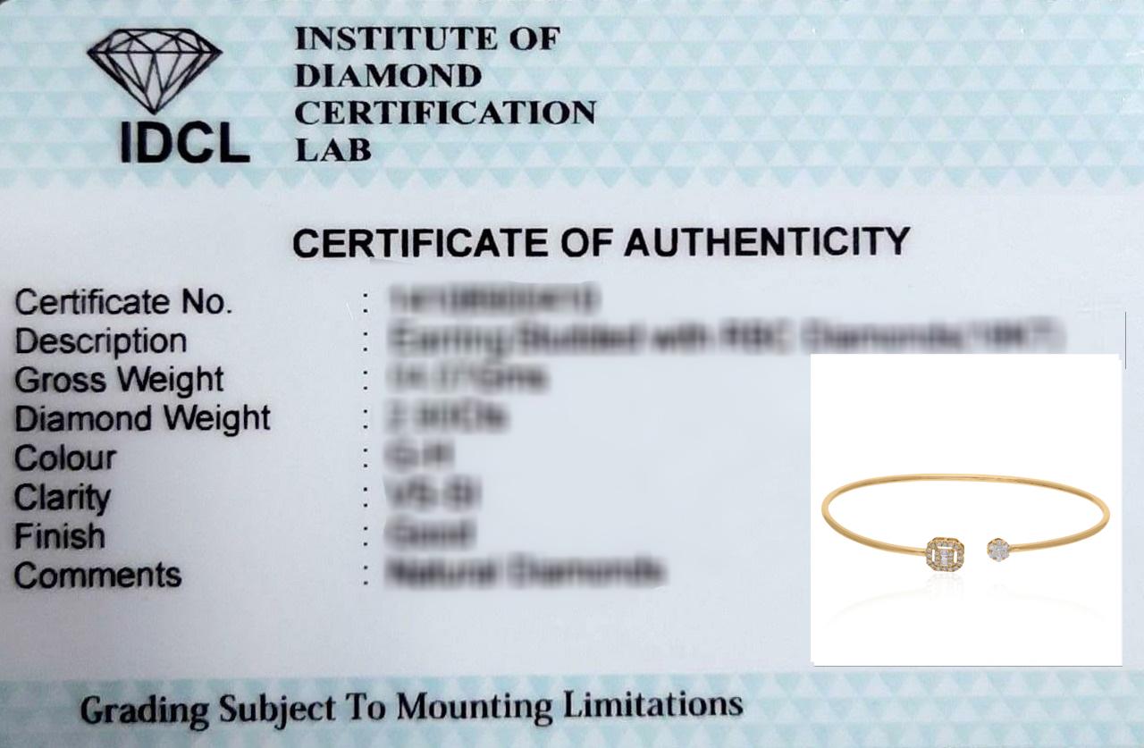 Bracelet manchette en or jaune 18 carats avec diamants ronds et baguettes en vente 1